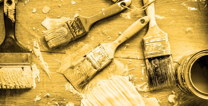 Flat lay of brushes isolated on white background